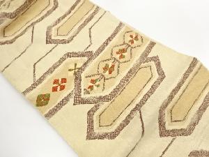 手織り真綿紬変わり亀甲に抽象花菱模様織出し名古屋帯